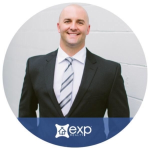 a waist-up shot of a man in a suit with the EXP Realty logo at the bottom