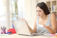 woman frustrated with website navigation