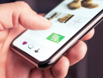 a closeup view of a person's finger purchasing a product on a smartphone