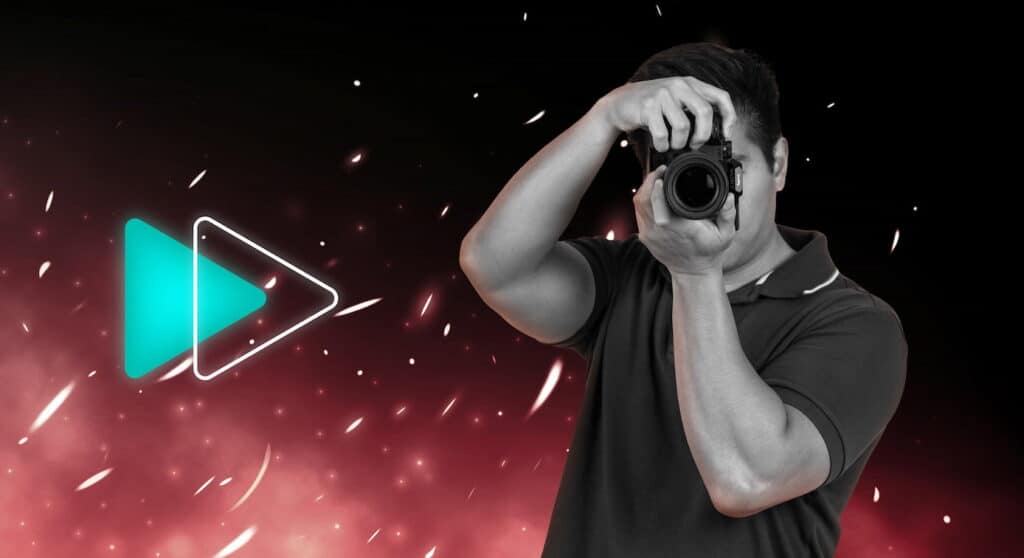 an image of a videographer with a graphic of sparks behind him