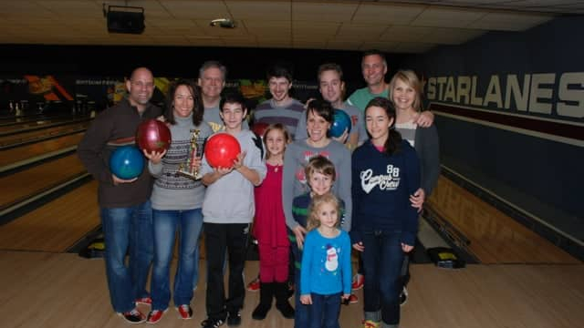 an image of the Drum Creative team at a bowling lane