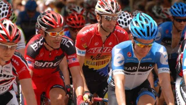 a group of several cyclists in a bike race