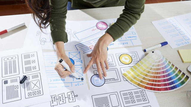woman choosing colors for a web design