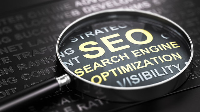 magnifying glass enlarging the word SEO